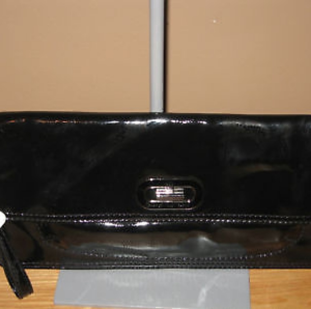 Franco Sarto turnstyle clutch handbag